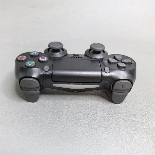 Беспроводной геймпад Sony DualShock 4 черный