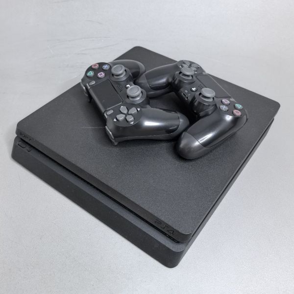 Игровая приставка Sony PlayStation 4 Slim 1000 ГБ HDD, без игр, черный + 2 геймпада