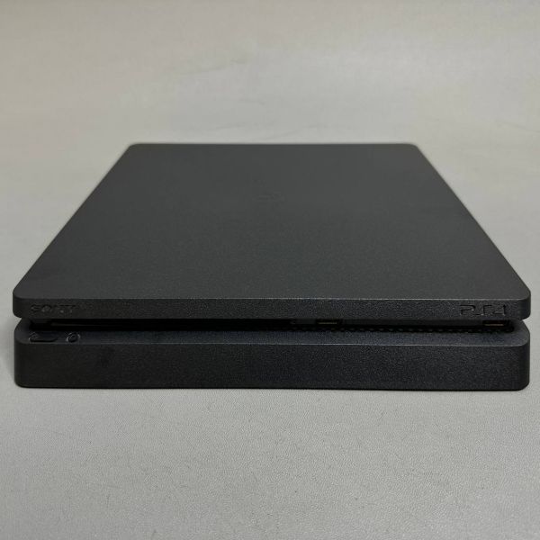 Игровая приставка Sony PlayStation 4 Slim 1000 ГБ HDD, без игр, черный + 2 геймпада