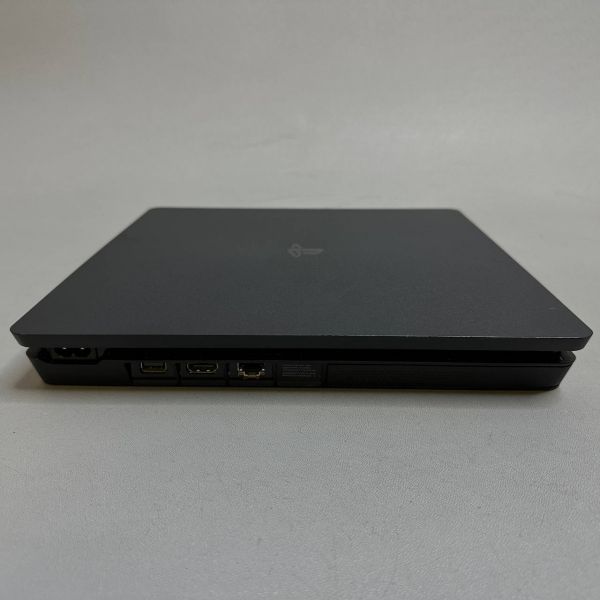 Игровая приставка Sony PlayStation 4 Slim 1000 ГБ HDD, без игр, черный + 2 геймпада