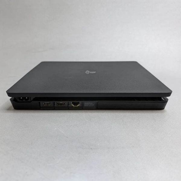 Игровая приставка Sony PlayStation 4 Slim 1000 ГБ HDD, без игр, черный + 2 геймпада