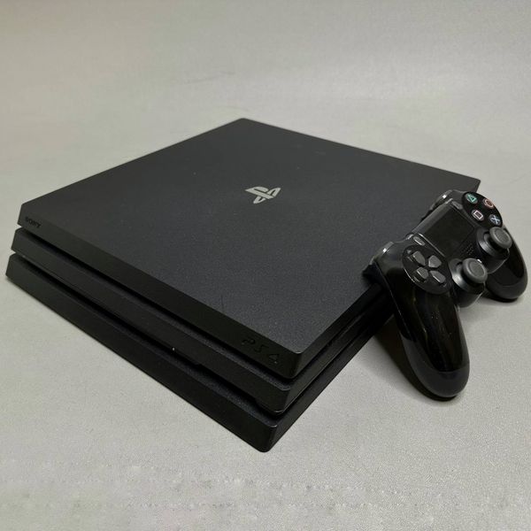 Игровая приставка Sony PlayStation 4 Pro 1000 ГБ HDD, без игр, черная