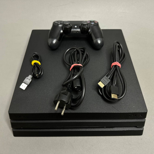 Игровая приставка Sony PlayStation 4 Pro 1000 ГБ HDD, без игр, черная