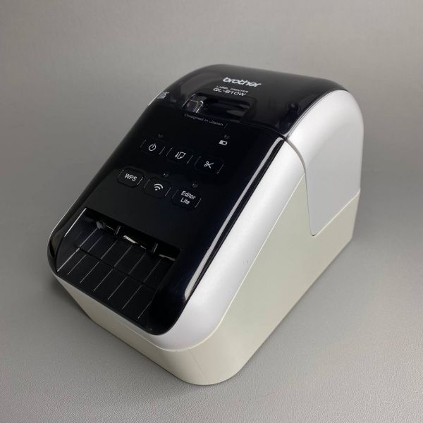 Термопринтер этикеток Brother QL-810W серебристый/черный