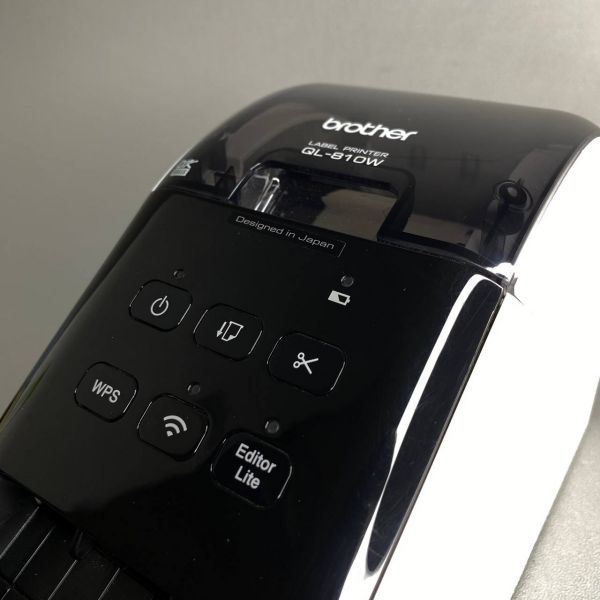 Термопринтер этикеток Brother QL-810W серебристый/черный