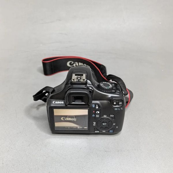 Зеркальный фотоаппарат Canon EOS 1100D Kit EF-S 18-55mm f/3.5-5.6 IS II, черный