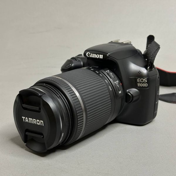 Зеркальный фотоаппарат Canon EOS-1100D+TAMRON AF 18-200/3.5-6.3, черный