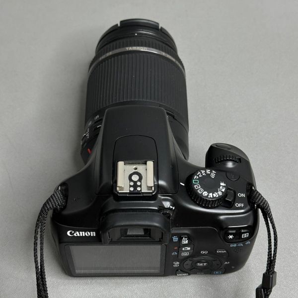 Зеркальный фотоаппарат Canon EOS-1100D+TAMRON AF 18-200/3.5-6.3, черный