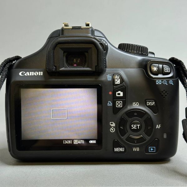 Зеркальный фотоаппарат Canon EOS-1100D+TAMRON AF 18-200/3.5-6.3, черный