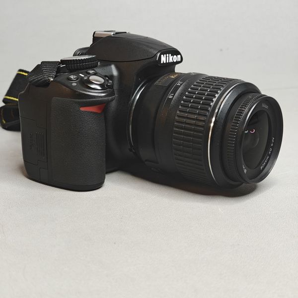Зеркальный фотоаппарат Nikon D3100 Kit AF-S DX NIKKOR 18-55mm f/3.5-5.6G II Ростест