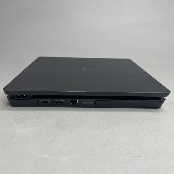 Игровая приставка Sony PlayStation 4 Slim 1000 ГБ HDD, без игр, черный + 2 геймпада