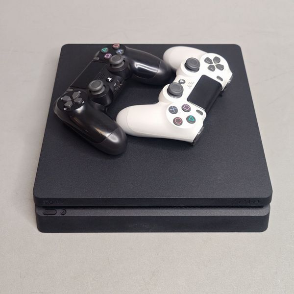 Игровая приставка Sony PlayStation 4 Slim 1000 ГБ HDD, без игр, черный + 2 геймпада