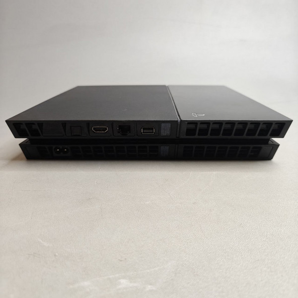 Игровая приставка Sony PlayStation 4 500 ГБ HDD, 2 геймпада, черная