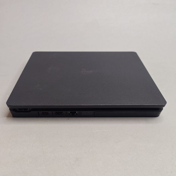 Игровая приставка Sony PlayStation 4 Slim 1000 ГБ HDD, без игр, черный + 2 геймпада