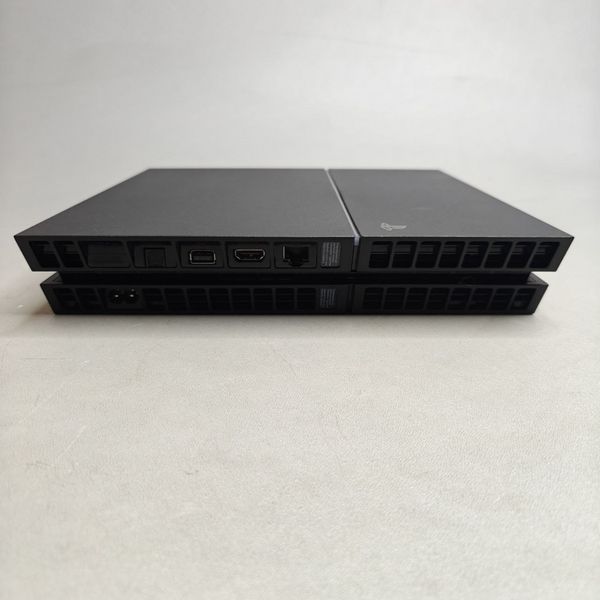 Игровая приставка Sony PlayStation 4 500 ГБ HDD, без игр, 2 геймпада, черная