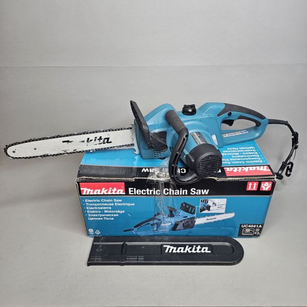 Цепная пила Makita UC4041A, электрическая, мощность 1800Вт, длина шины 40см, 56 звеньев