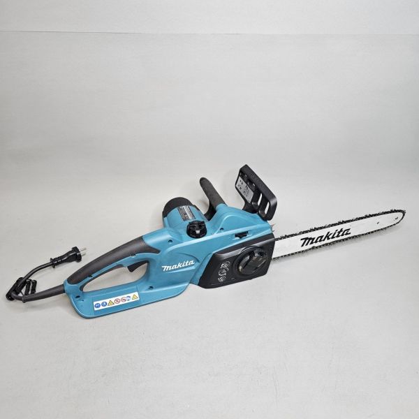 Цепная пила Makita UC4041A, электрическая, мощность 1800Вт, длина шины 40см, 56 звеньев